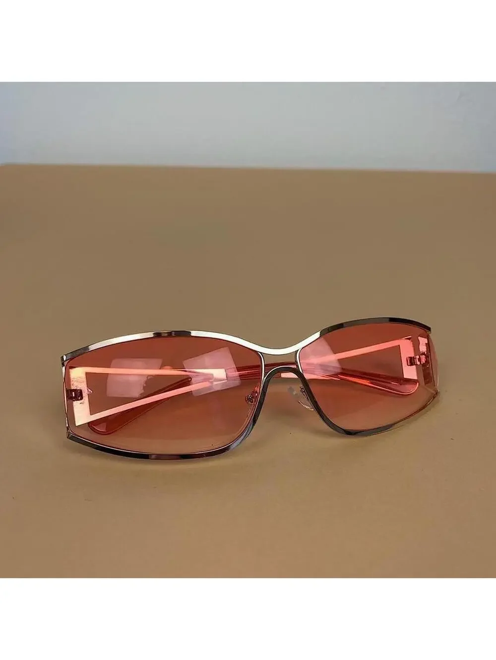 Vintage y2k 2000s classy pink chrome trim sunglasses. Chrome trim pink lenses